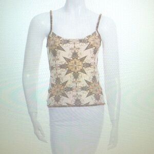 Chanel sleeveless top with metallic print and raised knit accents throughout.